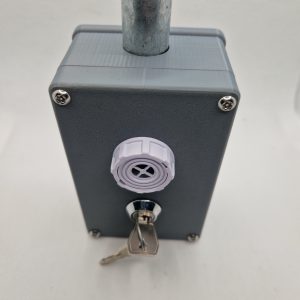 ACS Door Keyswitch - front view with key and conduit